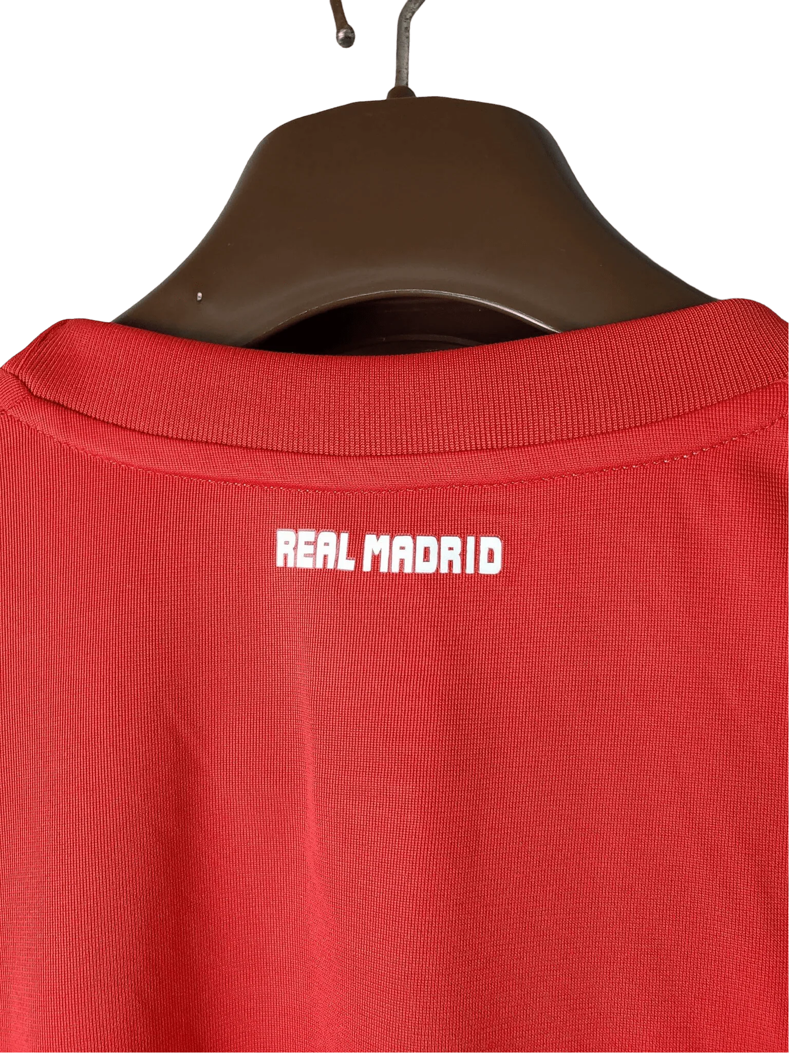 https://cdn.shopify.com/s/files/1/0826/7228/8075/files/20112012-real-madrid-bwin-third-retro-kit-long-sleeve-638770.webp?v=1741197465