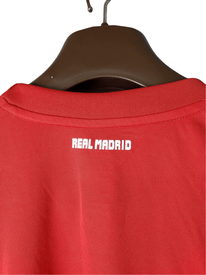 https://cdn.shopify.com/s/files/1/0826/7228/8075/files/20112012-real-madrid-bwin-third-retro-kit-long-sleeve-638770.webp?v=1741197465