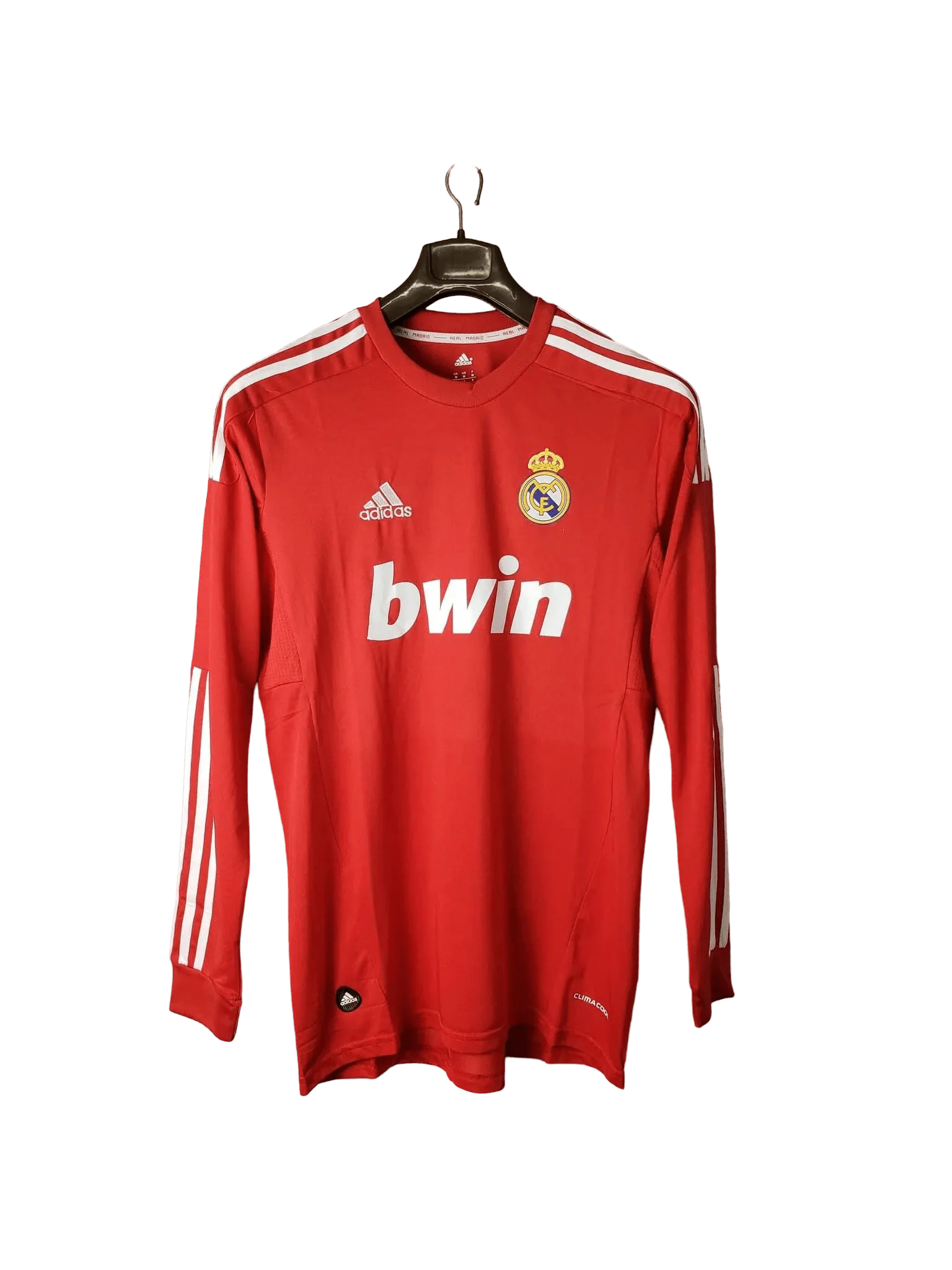 https://cdn.shopify.com/s/files/1/0826/7228/8075/files/20112012-real-madrid-bwin-third-retro-kit-long-sleeve-873071.webp?v=1741197462