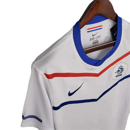 https://cdn.shopify.com/s/files/1/0826/7228/8075/files/2012-netherlands-away-retro-kit-258251.webp?v=1741197033