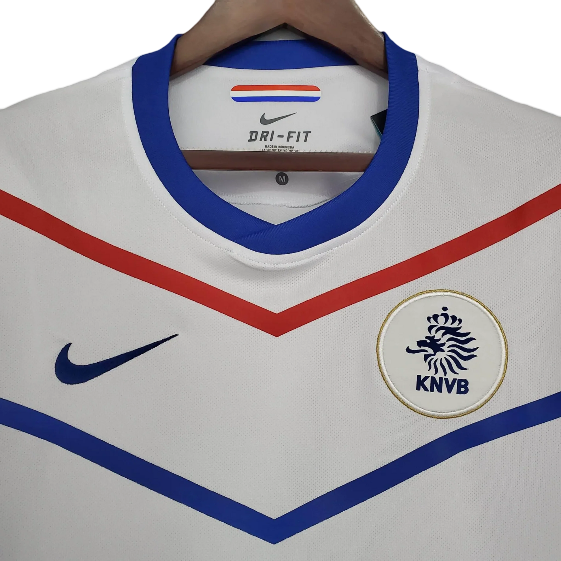 https://cdn.shopify.com/s/files/1/0826/7228/8075/files/2012-netherlands-away-retro-kit-506760.webp?v=1741197035