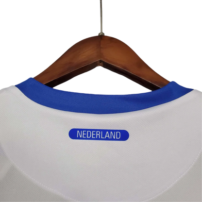 https://cdn.shopify.com/s/files/1/0826/7228/8075/files/2012-netherlands-away-retro-kit-817646.webp?v=1741197032