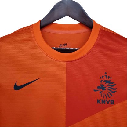 https://cdn.shopify.com/s/files/1/0826/7228/8075/files/2012-netherlands-home-retro-kit-671004.webp?v=1741197045