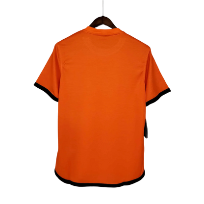 https://cdn.shopify.com/s/files/1/0826/7228/8075/files/2012-netherlands-home-retro-kit-675884.webp?v=1741197044