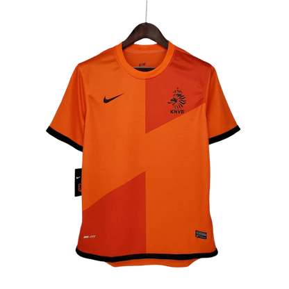 https://cdn.shopify.com/s/files/1/0826/7228/8075/files/2012-netherlands-home-retro-kit-996300.webp?v=1741197042