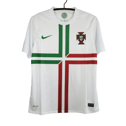 https://cdn.shopify.com/s/files/1/0826/7228/8075/files/2012-portugal-away-white-retro-kit-290928.webp?v=1741197027