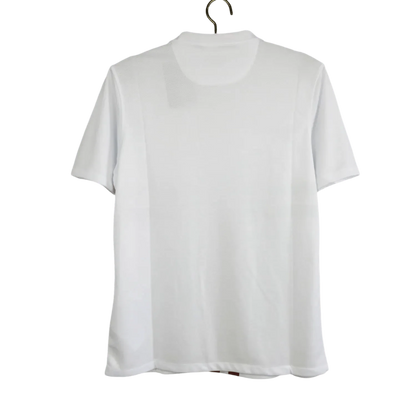 https://cdn.shopify.com/s/files/1/0826/7228/8075/files/2012-portugal-away-white-retro-kit-478462.webp?v=1741197026