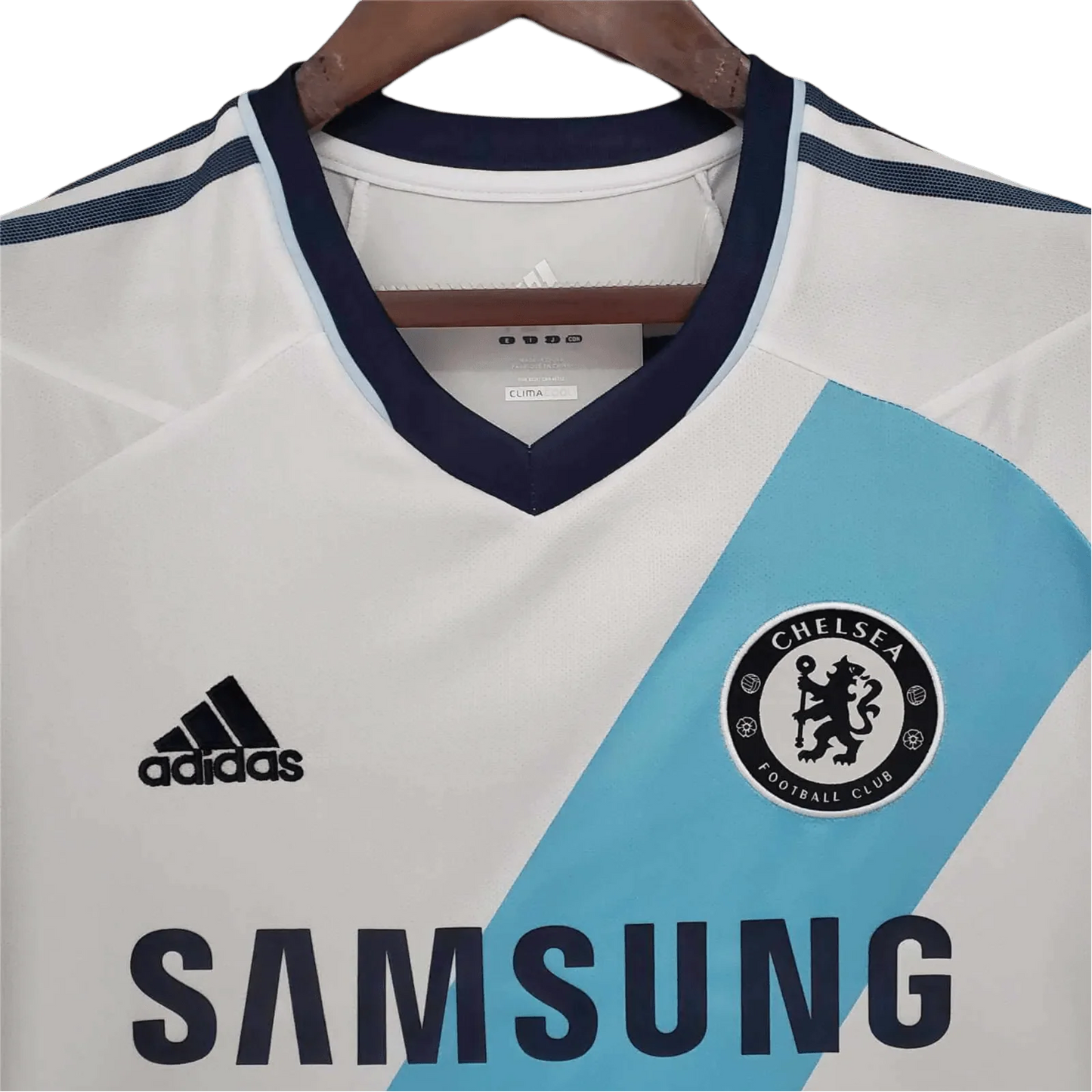 https://cdn.shopify.com/s/files/1/0826/7228/8075/files/20122013-chelsea-samsung-away-retro-kit-classickits433-661247.webp?v=1741198286