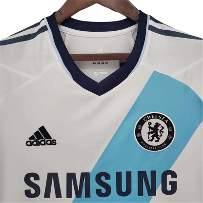 https://cdn.shopify.com/s/files/1/0826/7228/8075/files/20122013-chelsea-samsung-away-retro-kit-classickits433-661247.webp?v=1741198286