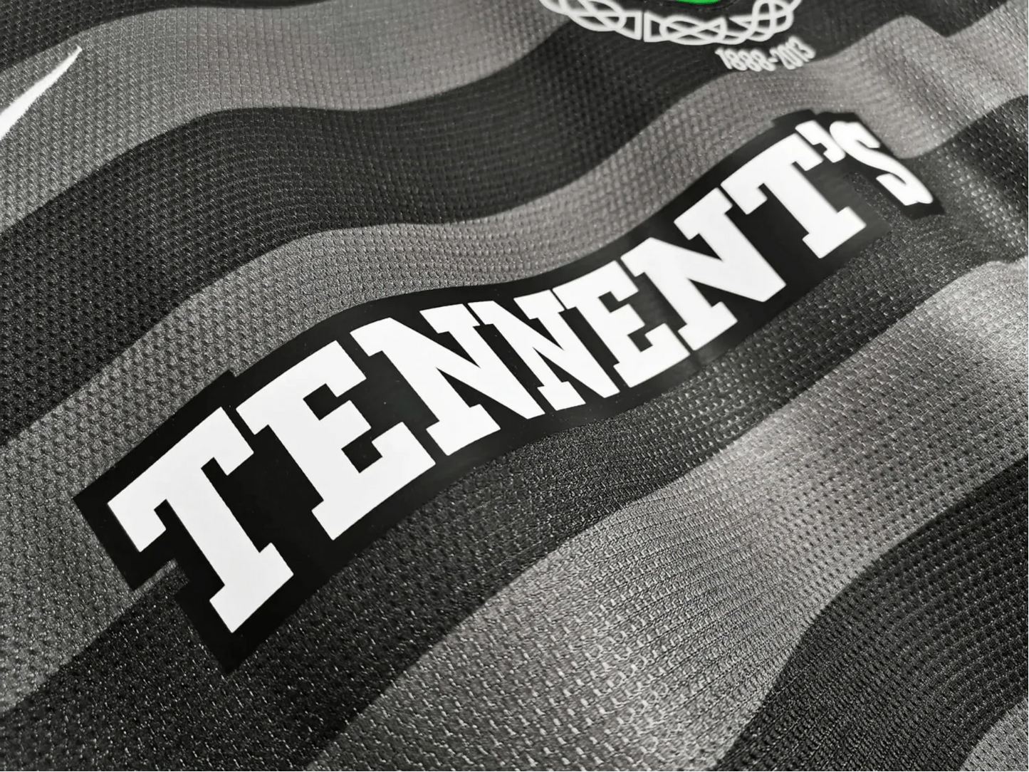 https://cdn.shopify.com/s/files/1/0826/7228/8075/files/20122013-glasgow-celtic-tennents-away-black-125th-anniv-retro-kit-classickits433-797064.webp?v=1741198260