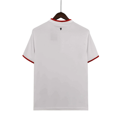 https://cdn.shopify.com/s/files/1/0826/7228/8075/files/20122013-manchester-united-aon-away-retro-kit-classickits433-618810.webp?v=1741197669