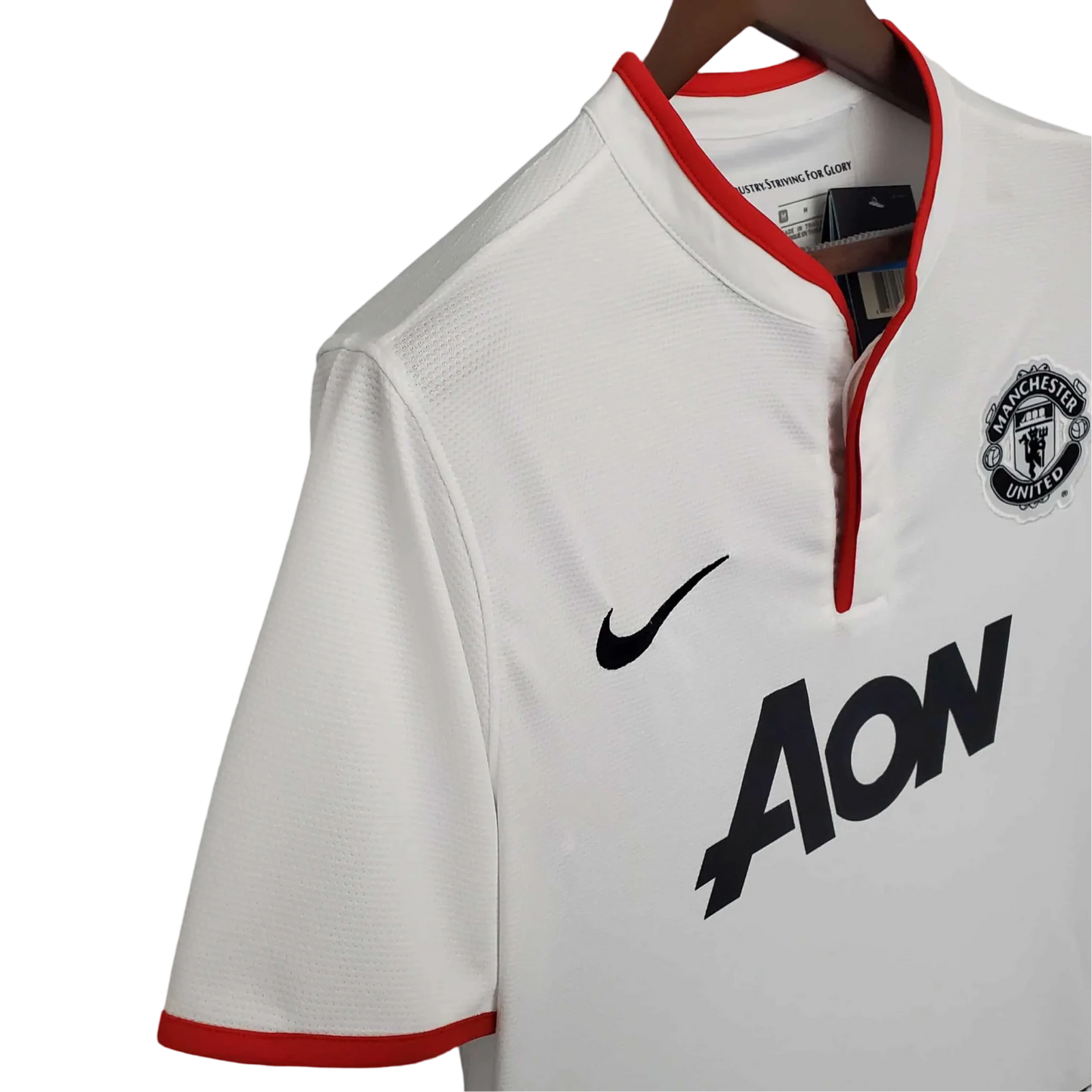 https://cdn.shopify.com/s/files/1/0826/7228/8075/files/20122013-manchester-united-aon-away-retro-kit-classickits433-852001.webp?v=1741197673