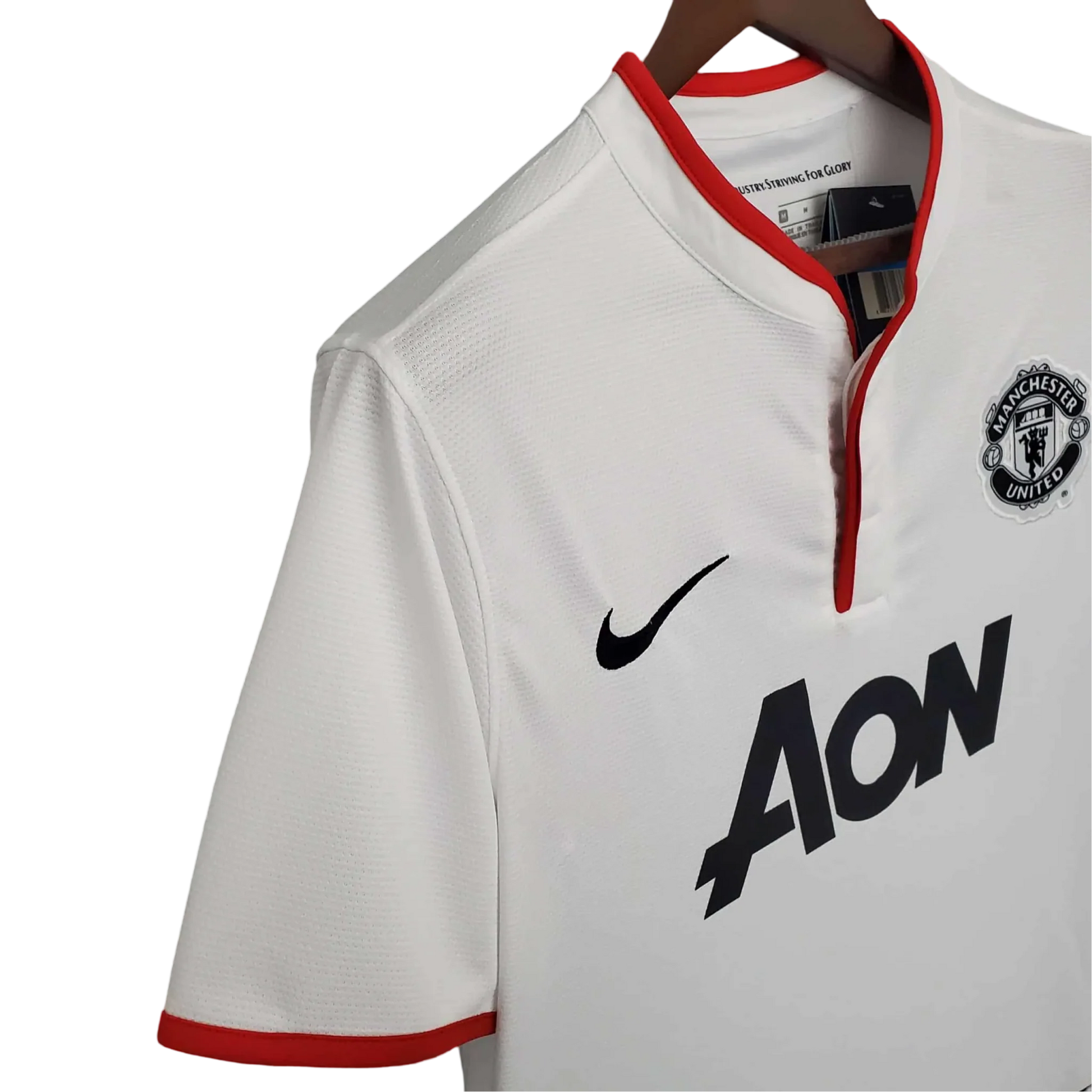 https://cdn.shopify.com/s/files/1/0826/7228/8075/files/20122013-manchester-united-aon-away-retro-kit-classickits433-852001.webp?v=1741197673