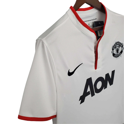 https://cdn.shopify.com/s/files/1/0826/7228/8075/files/20122013-manchester-united-aon-away-retro-kit-classickits433-852001.webp?v=1741197673