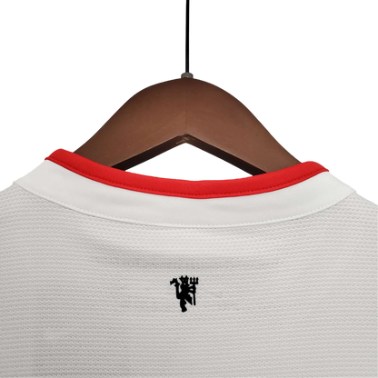 https://cdn.shopify.com/s/files/1/0826/7228/8075/files/20122013-manchester-united-aon-away-retro-kit-classickits433-899267.webp?v=1741197672