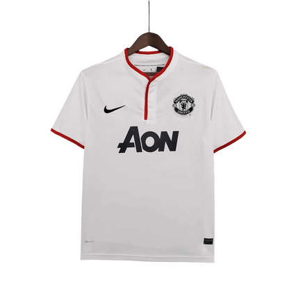https://cdn.shopify.com/s/files/1/0826/7228/8075/files/20122013-manchester-united-aon-away-retro-kit-classickits433-930644.webp?v=1741197671