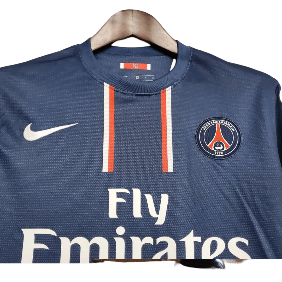https://cdn.shopify.com/s/files/1/0826/7228/8075/files/20122013-paris-saint-germain-fly-emirates-home-retro-jersey-499303.webp?v=1741198009