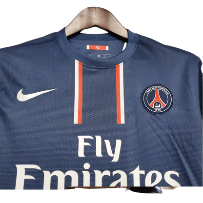 https://cdn.shopify.com/s/files/1/0826/7228/8075/files/20122013-paris-saint-germain-fly-emirates-home-retro-jersey-499303.webp?v=1741198009