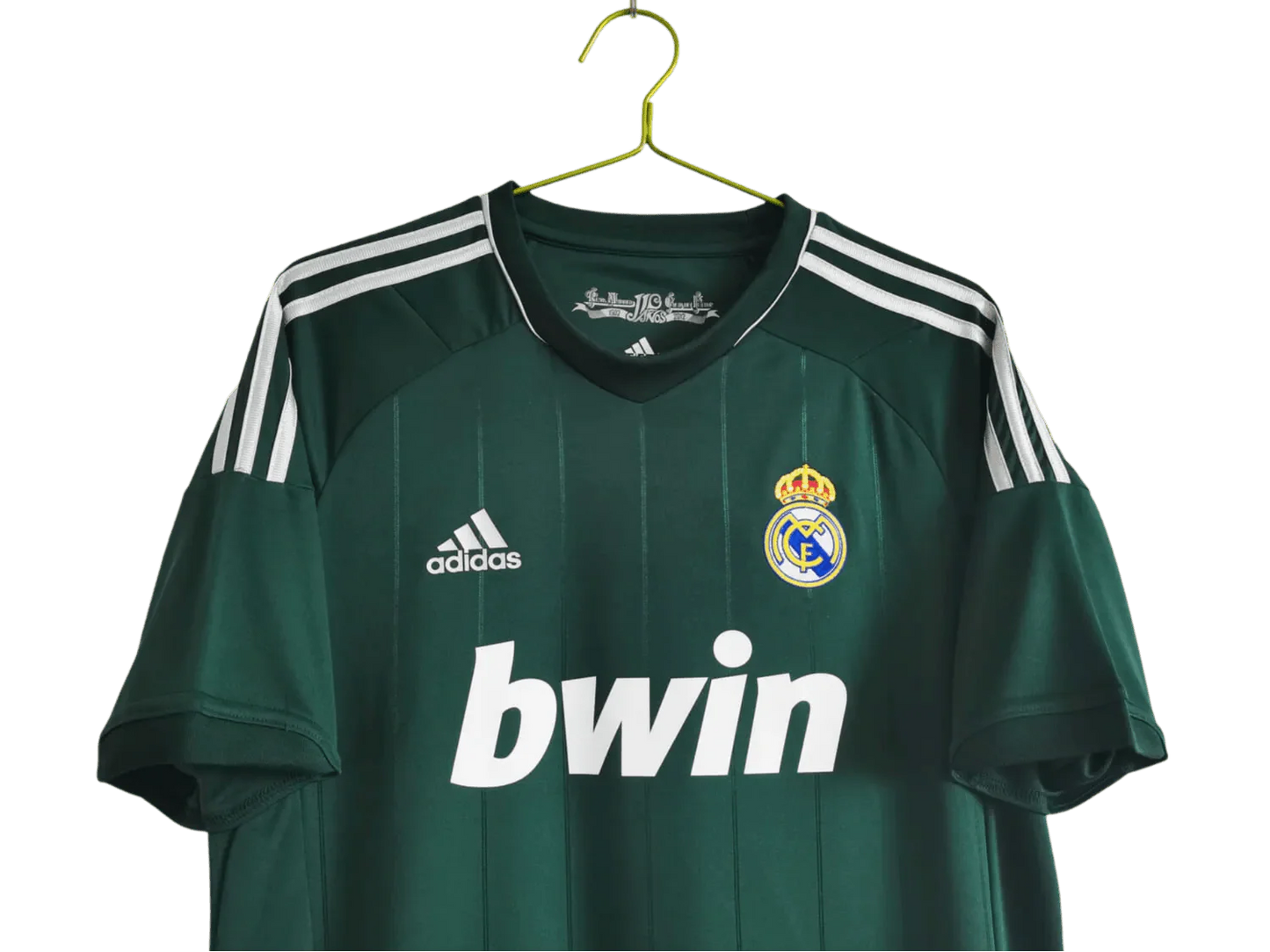 https://cdn.shopify.com/s/files/1/0826/7228/8075/files/20122013-real-madrid-bwin-3rd-green-retro-kit-122239.webp?v=1741197482