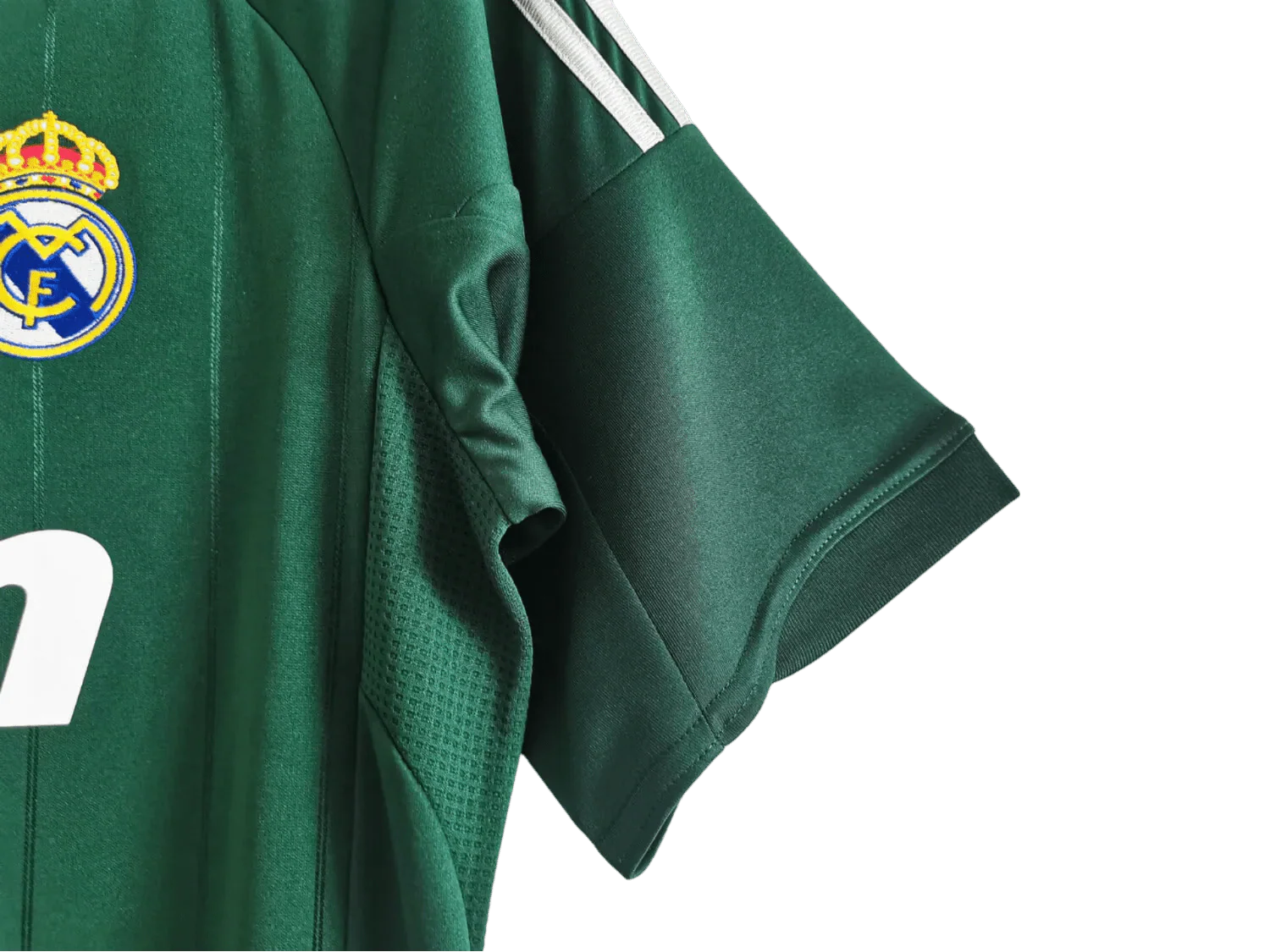 https://cdn.shopify.com/s/files/1/0826/7228/8075/files/20122013-real-madrid-bwin-3rd-green-retro-kit-267155.webp?v=1741197482