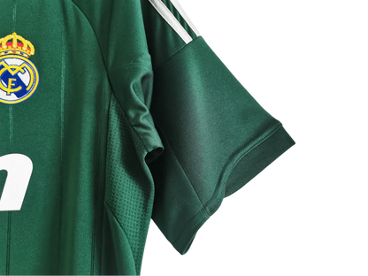 https://cdn.shopify.com/s/files/1/0826/7228/8075/files/20122013-real-madrid-bwin-3rd-green-retro-kit-267155.webp?v=1741197482