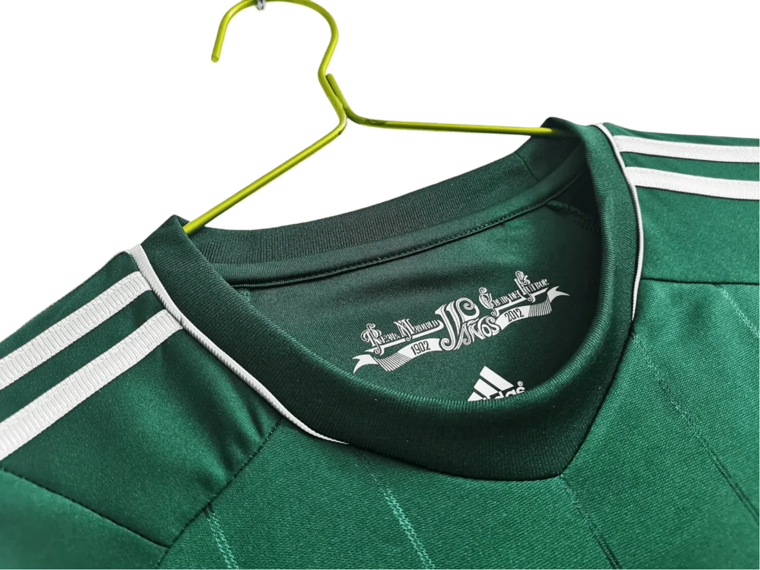 https://cdn.shopify.com/s/files/1/0826/7228/8075/files/20122013-real-madrid-bwin-3rd-green-retro-kit-359262.webp?v=1741197538