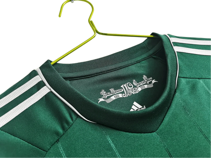 https://cdn.shopify.com/s/files/1/0826/7228/8075/files/20122013-real-madrid-bwin-3rd-green-retro-kit-359262.webp?v=1741197538