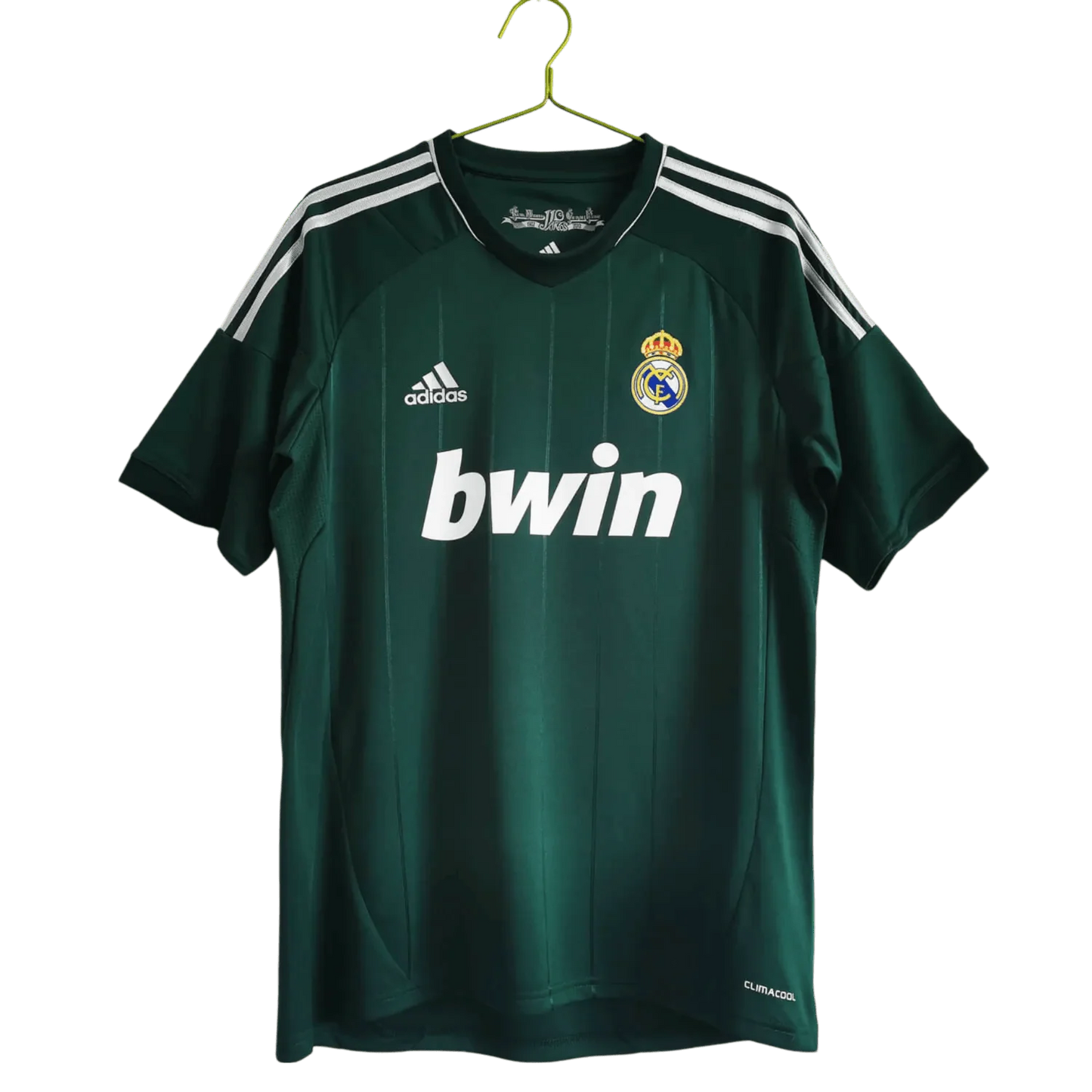 https://cdn.shopify.com/s/files/1/0826/7228/8075/files/20122013-real-madrid-bwin-3rd-green-retro-kit-468717.webp?v=1741197480