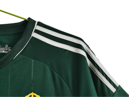 https://cdn.shopify.com/s/files/1/0826/7228/8075/files/20122013-real-madrid-bwin-3rd-green-retro-kit-735579.webp?v=1741197482