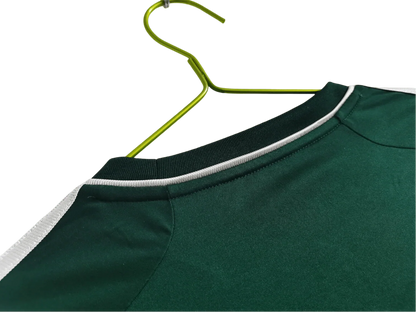 https://cdn.shopify.com/s/files/1/0826/7228/8075/files/20122013-real-madrid-bwin-3rd-green-retro-kit-989204.webp?v=1741197539