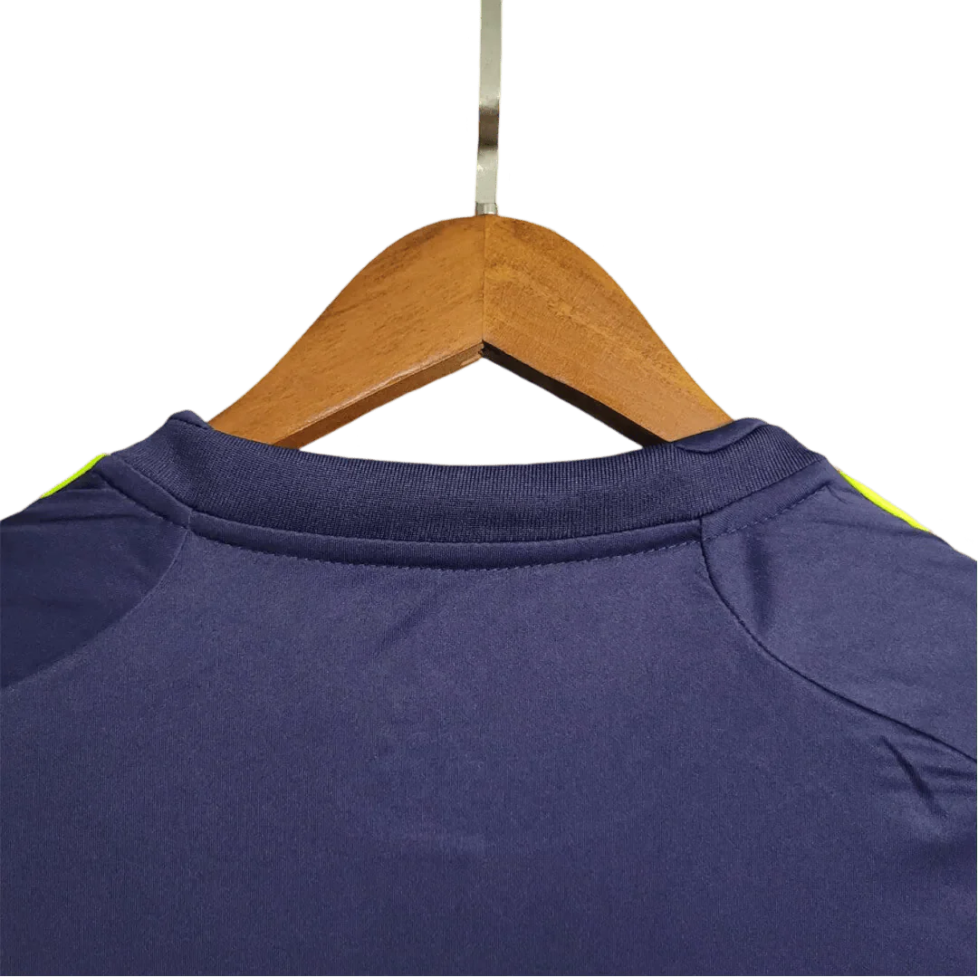 https://cdn.shopify.com/s/files/1/0826/7228/8075/files/20122013-real-madrid-bwin-away-retro-kit-320678.webp?v=1741197476