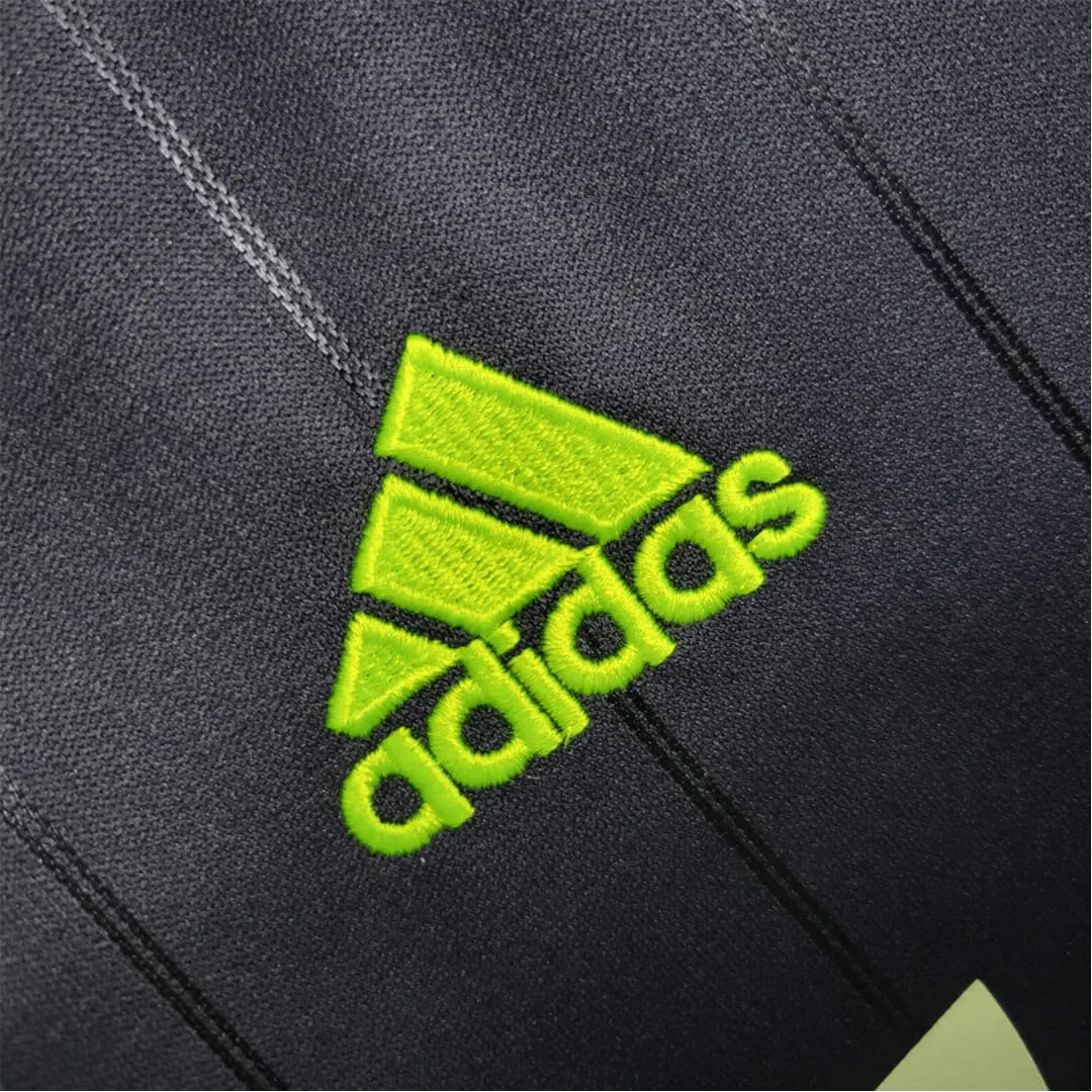 https://cdn.shopify.com/s/files/1/0826/7228/8075/files/20122013-real-madrid-bwin-away-retro-kit-498496.webp?v=1741197479