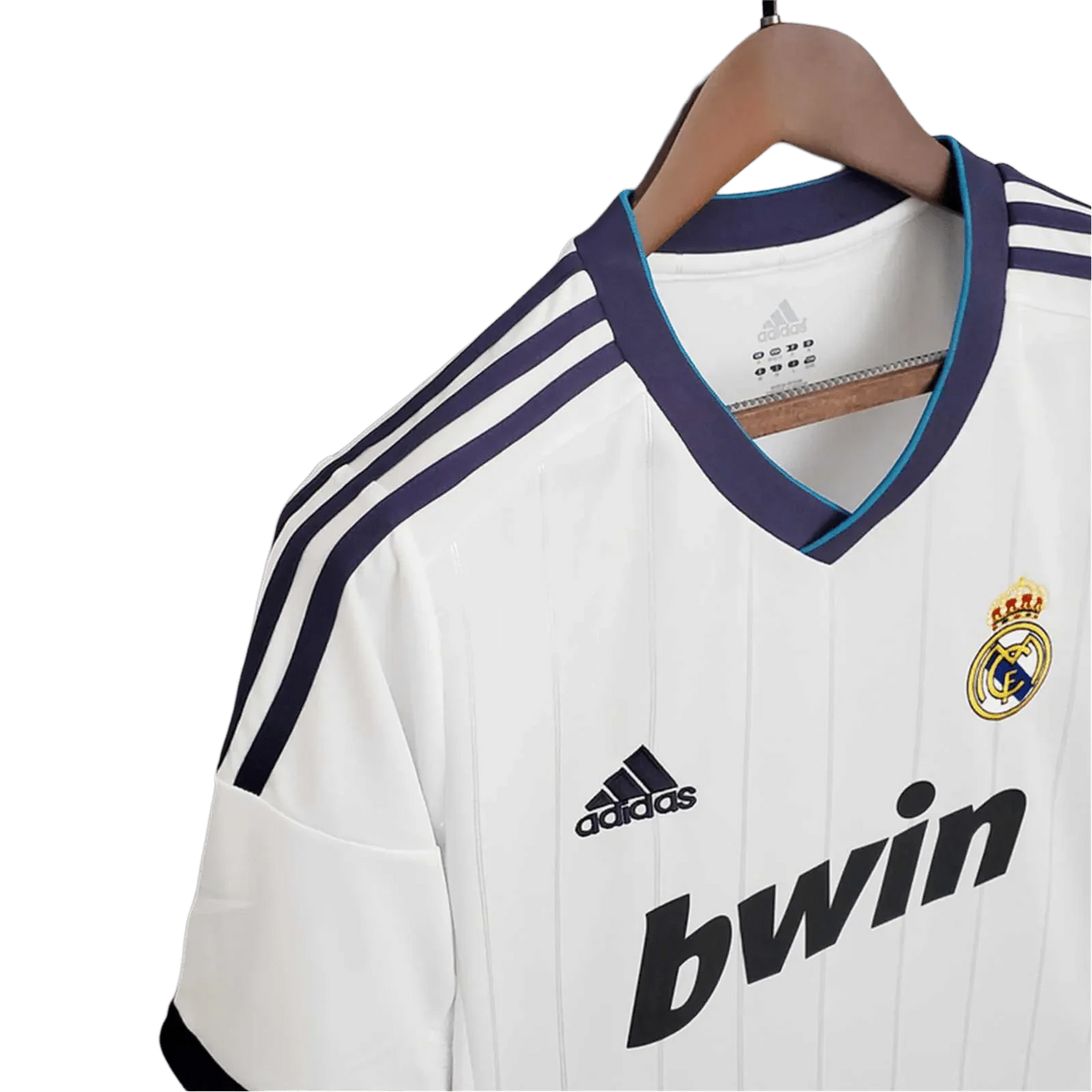 https://cdn.shopify.com/s/files/1/0826/7228/8075/files/20122013-real-madrid-bwin-home-retro-kit-467394.webp?v=1741197439