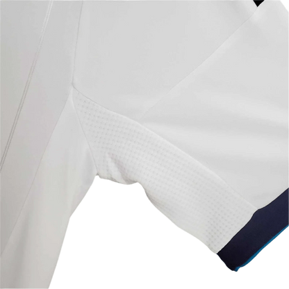 https://cdn.shopify.com/s/files/1/0826/7228/8075/files/20122013-real-madrid-bwin-home-retro-kit-514980.webp?v=1741197438