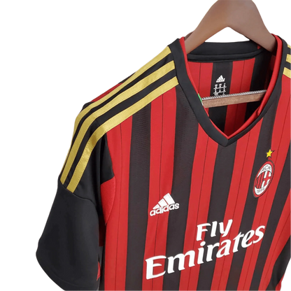 https://cdn.shopify.com/s/files/1/0826/7228/8075/files/20132014-ac-milan-fly-emirates-home-retro-kit-283849.webp?v=1741197450