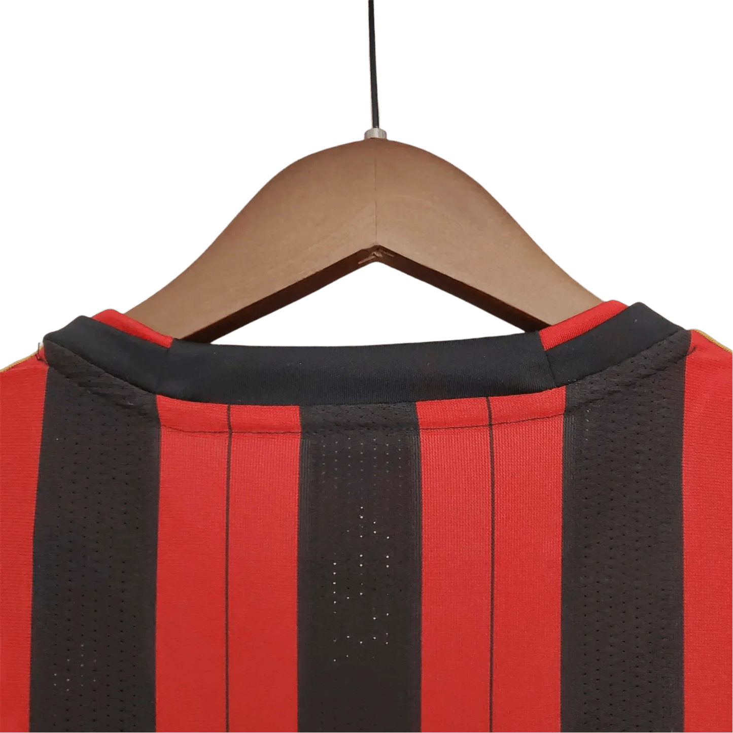 https://cdn.shopify.com/s/files/1/0826/7228/8075/files/20132014-ac-milan-fly-emirates-home-retro-kit-344877.webp?v=1741197451