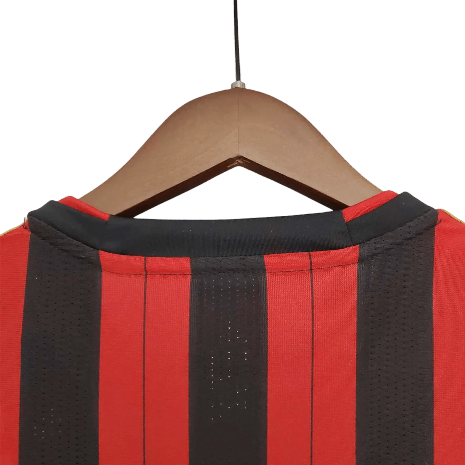 https://cdn.shopify.com/s/files/1/0826/7228/8075/files/20132014-ac-milan-fly-emirates-home-retro-kit-344877.webp?v=1741197451