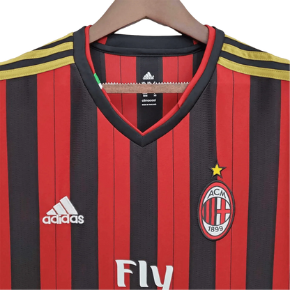 https://cdn.shopify.com/s/files/1/0826/7228/8075/files/20132014-ac-milan-fly-emirates-home-retro-kit-518328.webp?v=1741197451