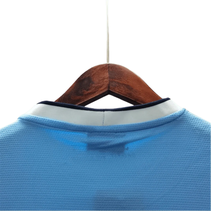 https://cdn.shopify.com/s/files/1/0826/7228/8075/files/20132014-manchester-city-etihad-airways-home-retro-kit-classickits43-157037.webp?v=1741198272