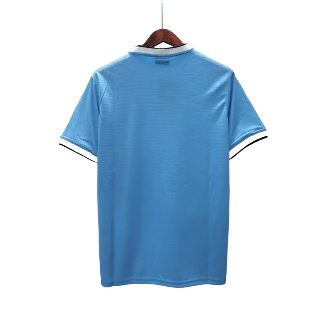 https://cdn.shopify.com/s/files/1/0826/7228/8075/files/20132014-manchester-city-etihad-airways-home-retro-kit-classickits43-744149.webp?v=1741198269