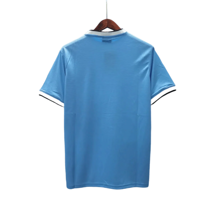 https://cdn.shopify.com/s/files/1/0826/7228/8075/files/20132014-manchester-city-etihad-airways-home-retro-kit-classickits43-744149.webp?v=1741198269