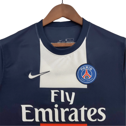 https://cdn.shopify.com/s/files/1/0826/7228/8075/files/20132014-paris-saint-germain-fly-emirates-home-retro-jersey-958481.webp?v=1741198013