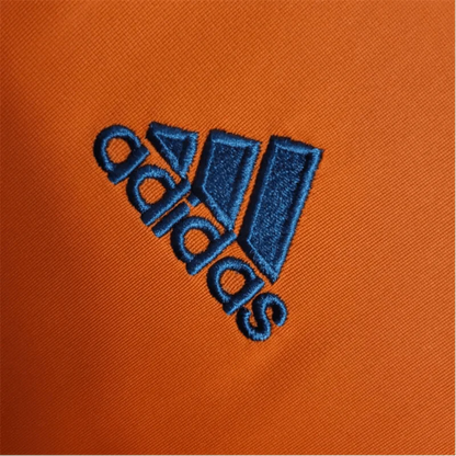 https://cdn.shopify.com/s/files/1/0826/7228/8075/files/20132014-real-madrid-fly-emirates-2nd-away-retro-kit-196771.webp?v=1741197275