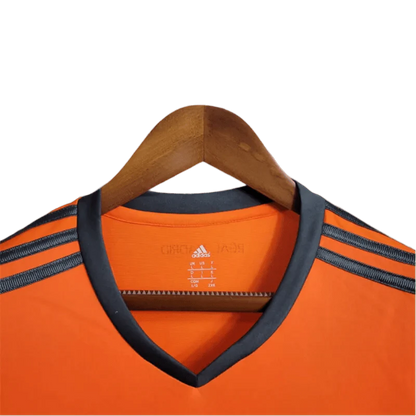 https://cdn.shopify.com/s/files/1/0826/7228/8075/files/20132014-real-madrid-fly-emirates-2nd-away-retro-kit-234746.webp?v=1741197273