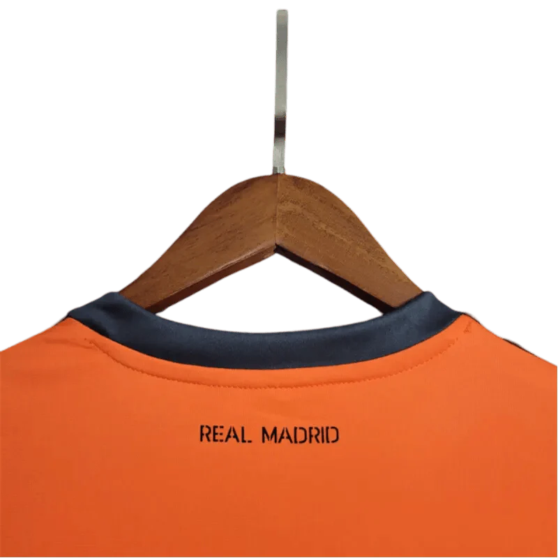 https://cdn.shopify.com/s/files/1/0826/7228/8075/files/20132014-real-madrid-fly-emirates-2nd-away-retro-kit-560315.webp?v=1741197275