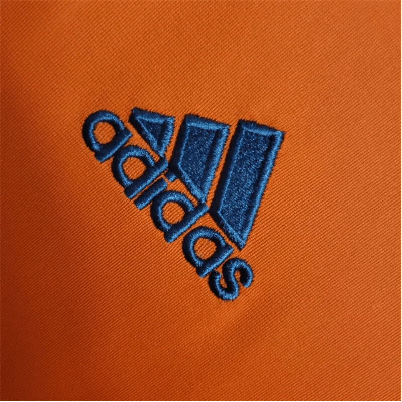 https://cdn.shopify.com/s/files/1/0826/7228/8075/files/20132014-real-madrid-fly-emirates-2nd-away-retro-kit-long-sleeve-375718.webp?v=1741197453