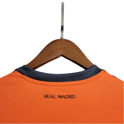 https://cdn.shopify.com/s/files/1/0826/7228/8075/files/20132014-real-madrid-fly-emirates-2nd-away-retro-kit-long-sleeve-673182.webp?v=1741197451