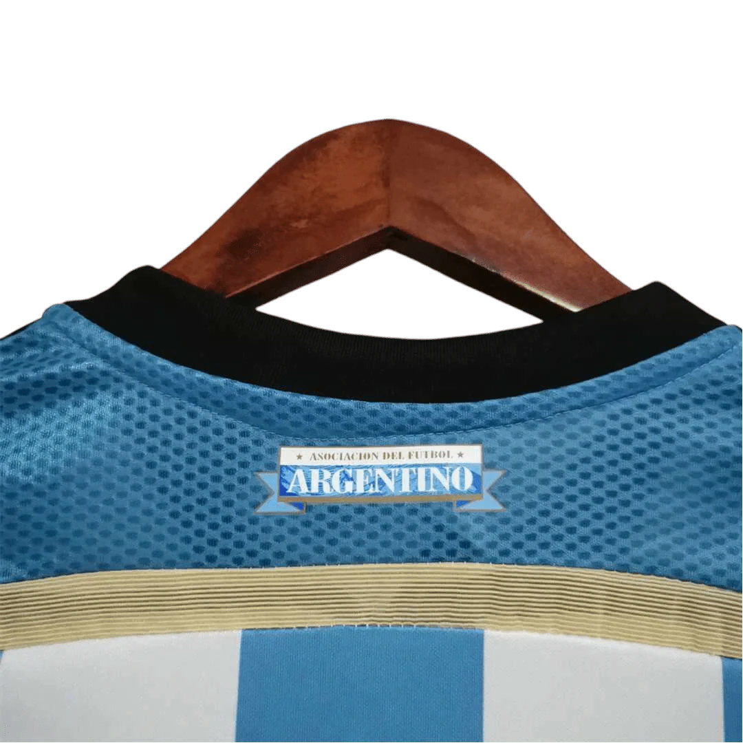 https://cdn.shopify.com/s/files/1/0826/7228/8075/files/2014-argentina-world-cup-home-retro-kit-classickits433-860520.webp?v=1741198784