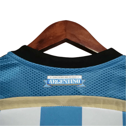 https://cdn.shopify.com/s/files/1/0826/7228/8075/files/2014-argentina-world-cup-home-retro-kit-classickits433-860520.webp?v=1741198784