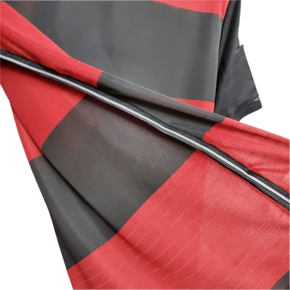 https://cdn.shopify.com/s/files/1/0826/7228/8075/files/2014-germany-away-black-red-retro-kit-604082.webp?v=1741197024
